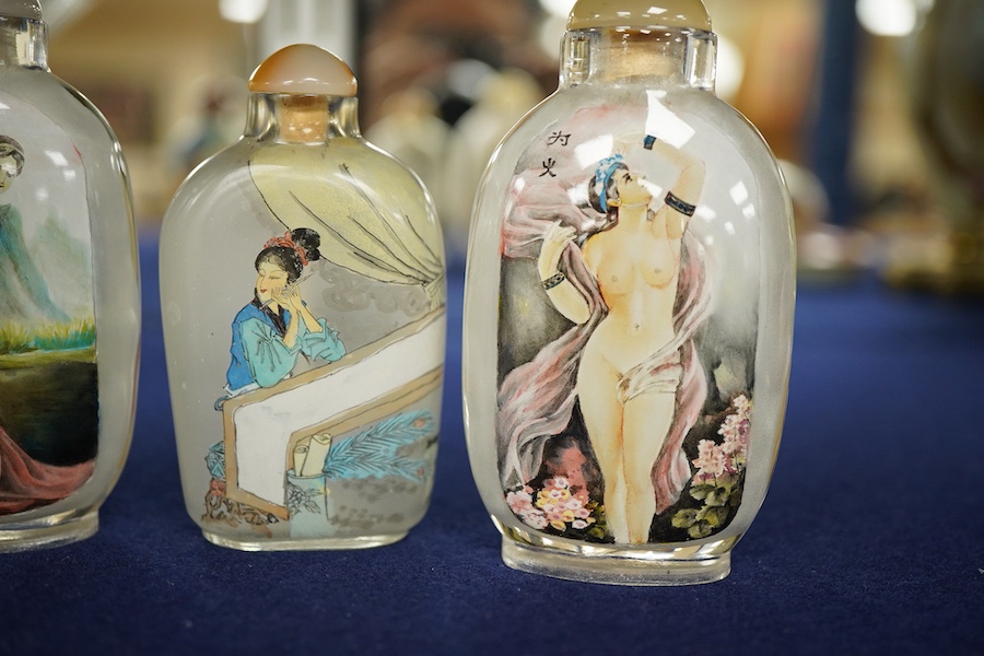 Four Chinese inside painted glass snuff bottles, tallest 9cm